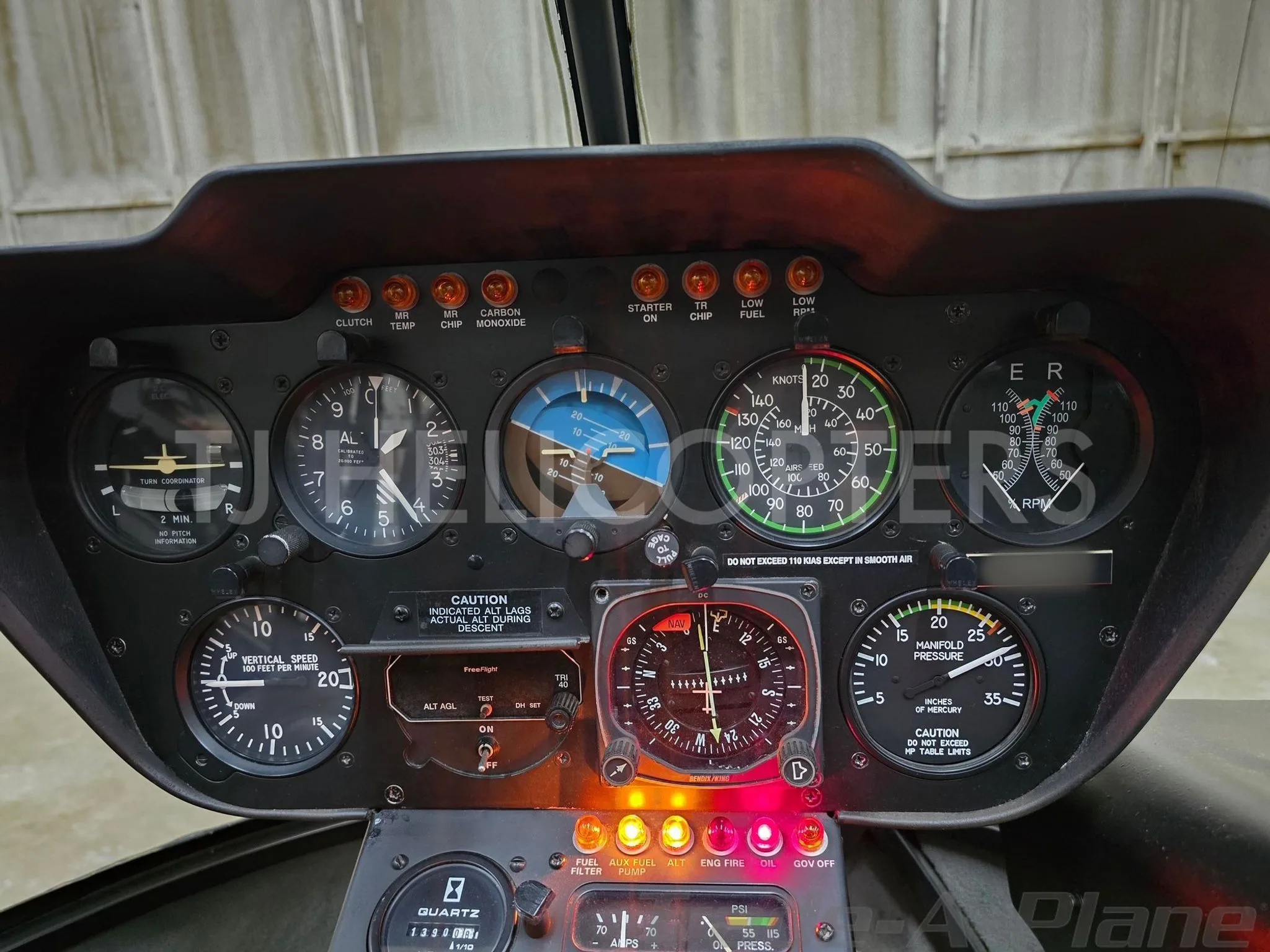 Cockpit and instrument panel of a 2007 ROBINSON R44 RAVEN II.