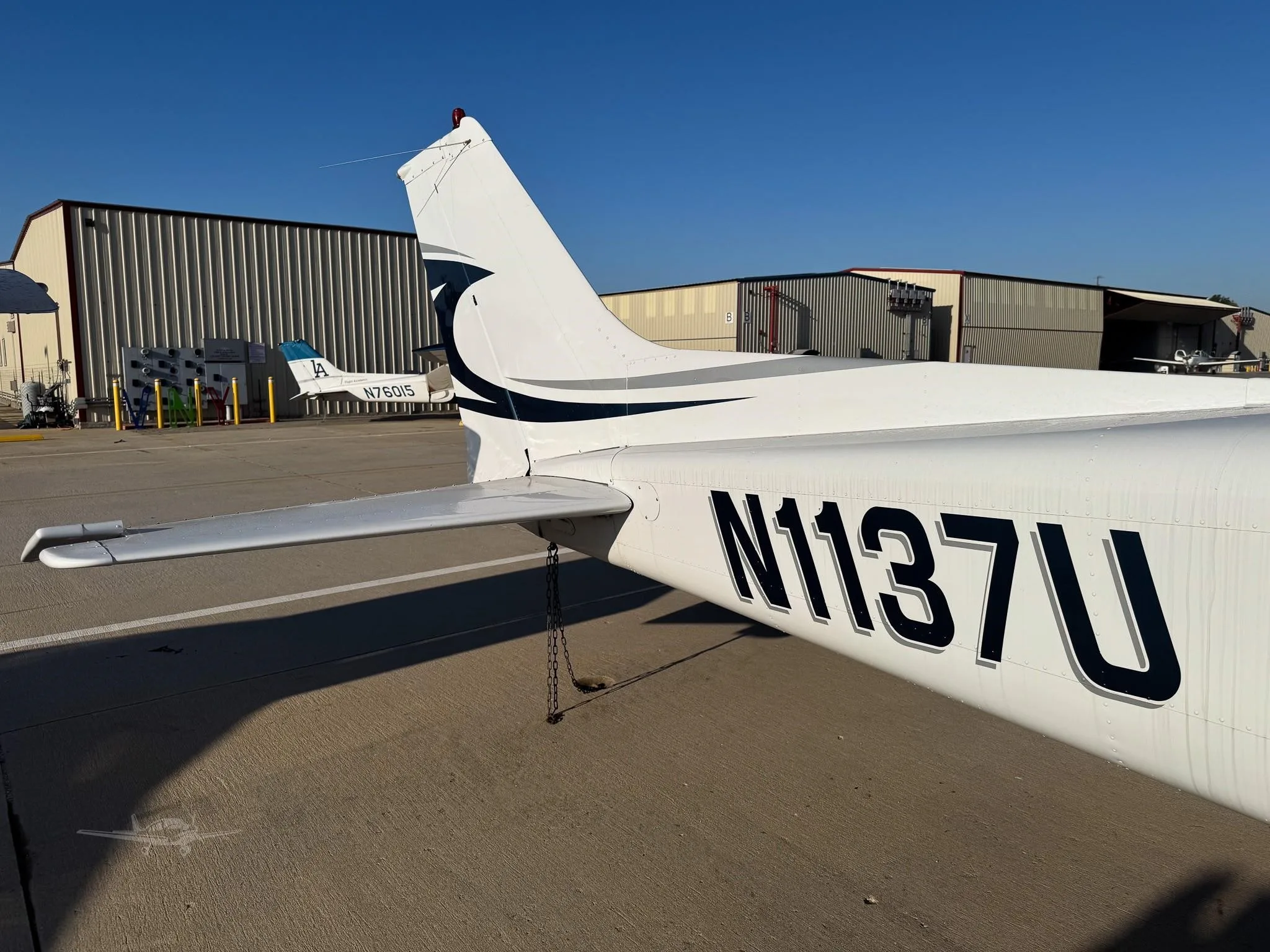 Exterior view of a 1976 CESSNA 172M SKYHAWK, N1137U.