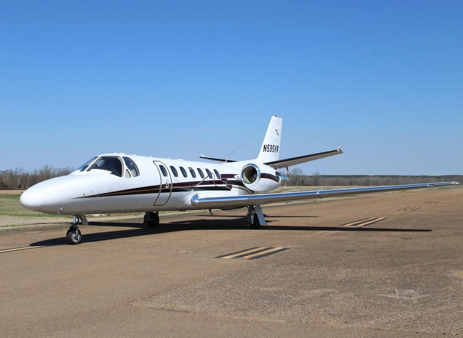 Exterior view of a 2002 CESSNA CITATION ENCORE, N595KW.