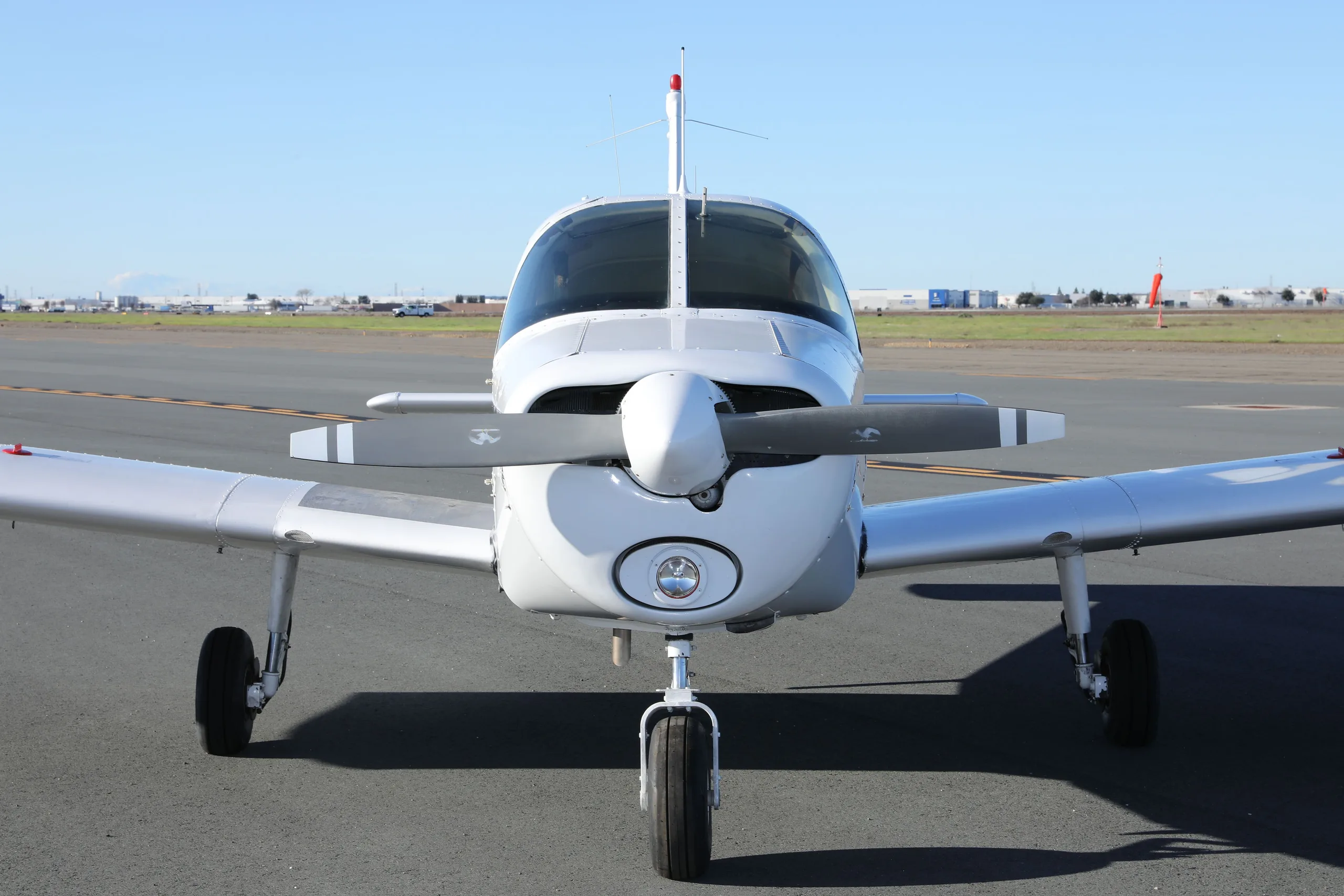 Exterior view of a 1977 Piper Cherokee 140, N38477.