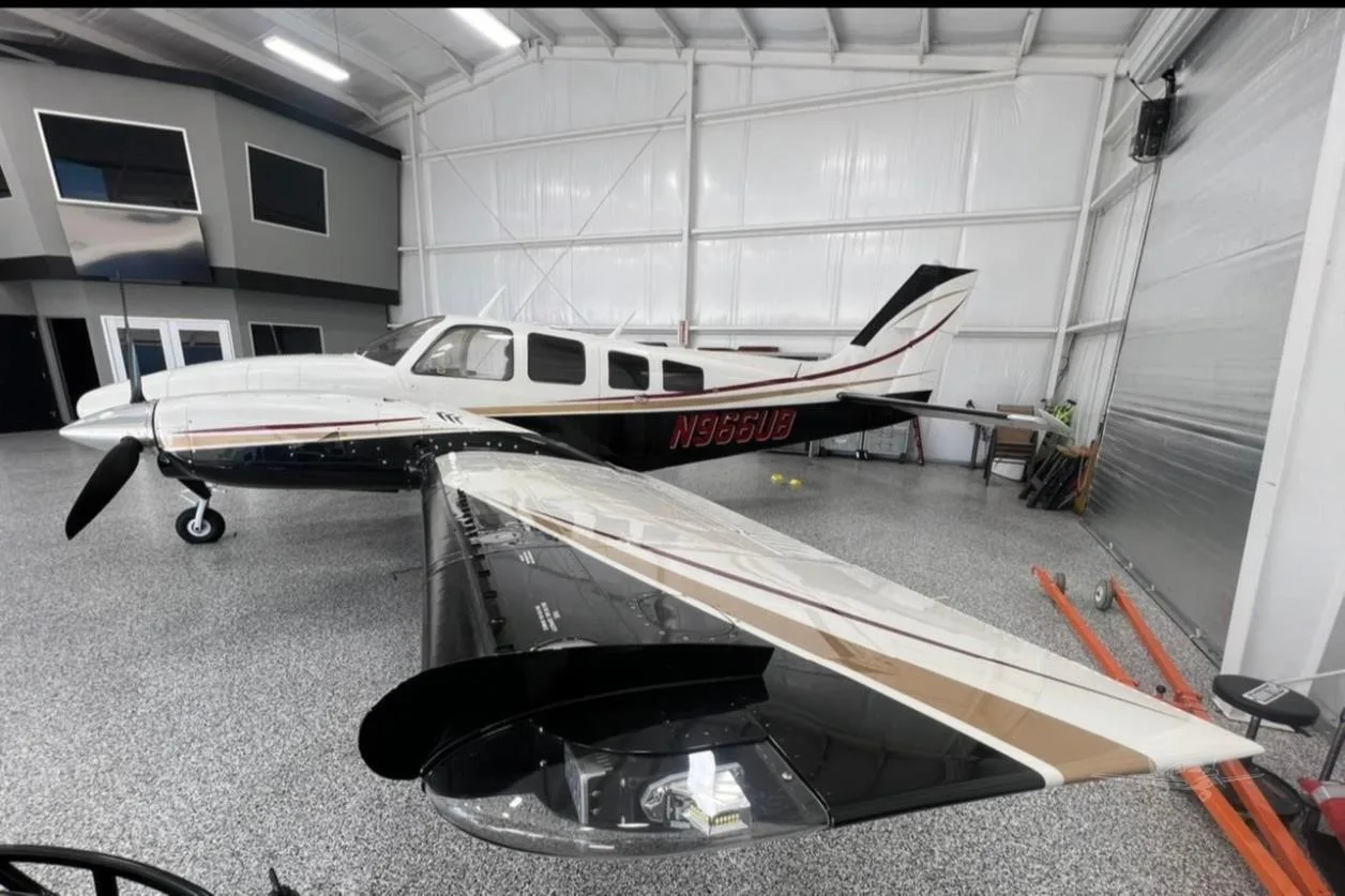 Exterior view of a 1977 BEECHCRAFT 58P BARON, N966UB.
