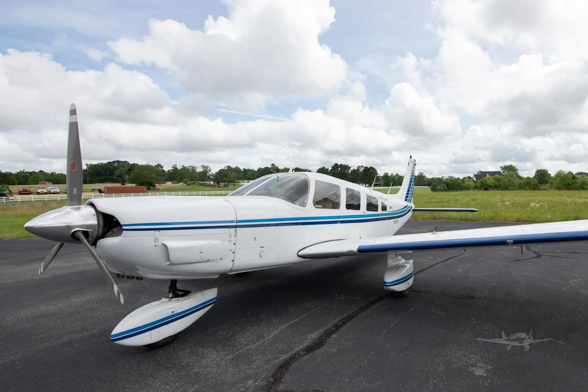 Exterior view of a 1977 PIPER CHEROKEE 6/300, N2617M.