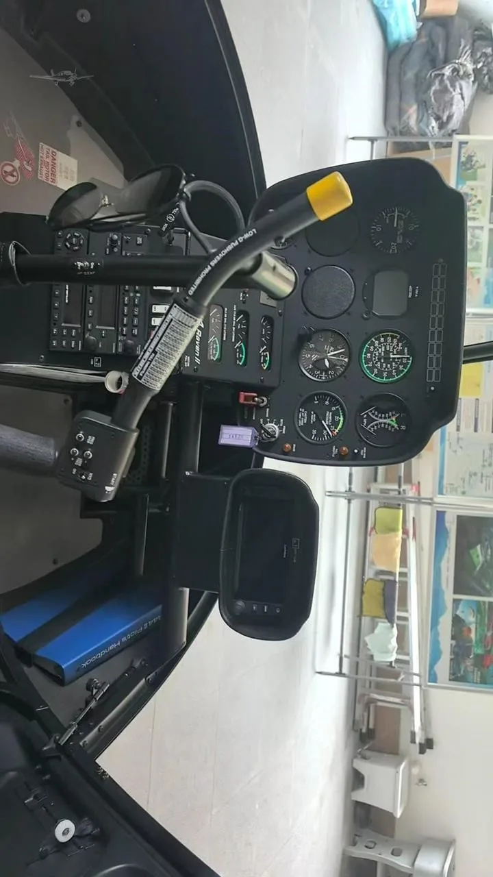 Cockpit and instrument panel of a 2022 ROBINSON R44 RAVEN II.