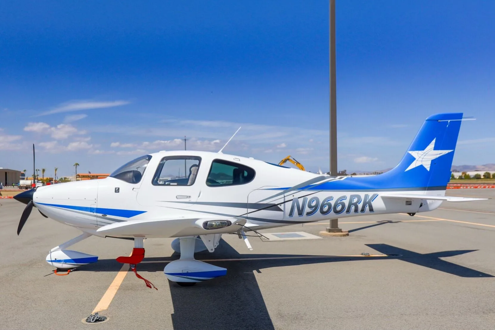 Exterior view of a 2016 Cirrus SR20-G3, N966RK.