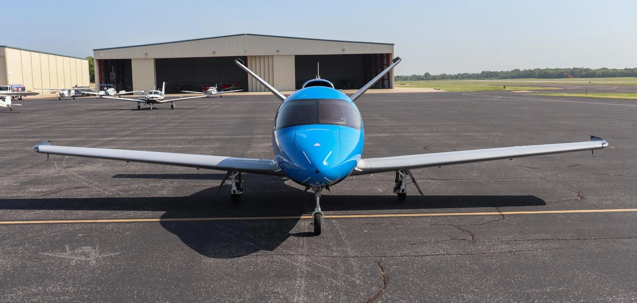 Exterior view of a 2021 CIRRUS VISION SF50-G2+, N818LL.
