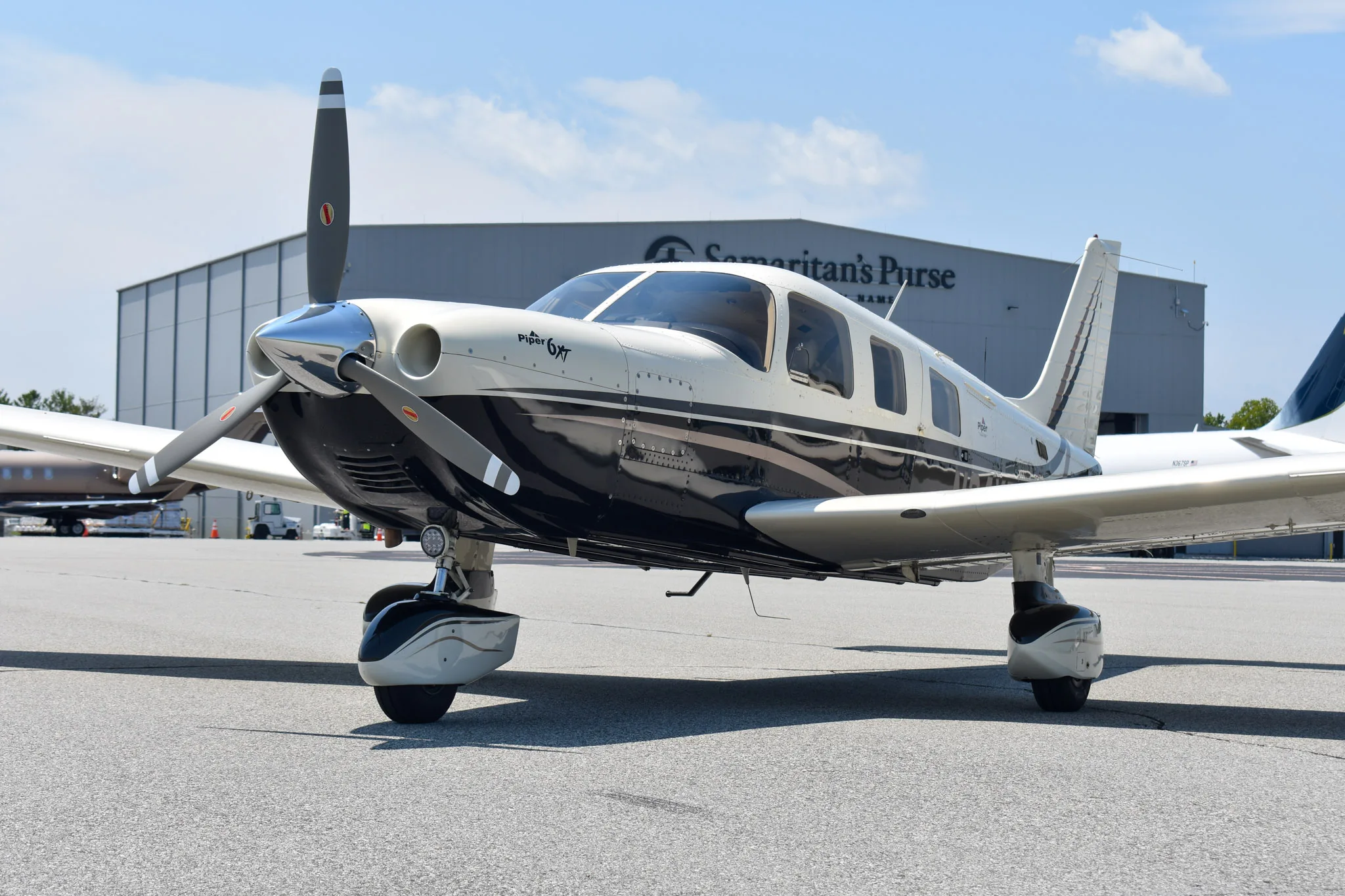 Exterior view of a 2005 Piper 6XT, N34XT.