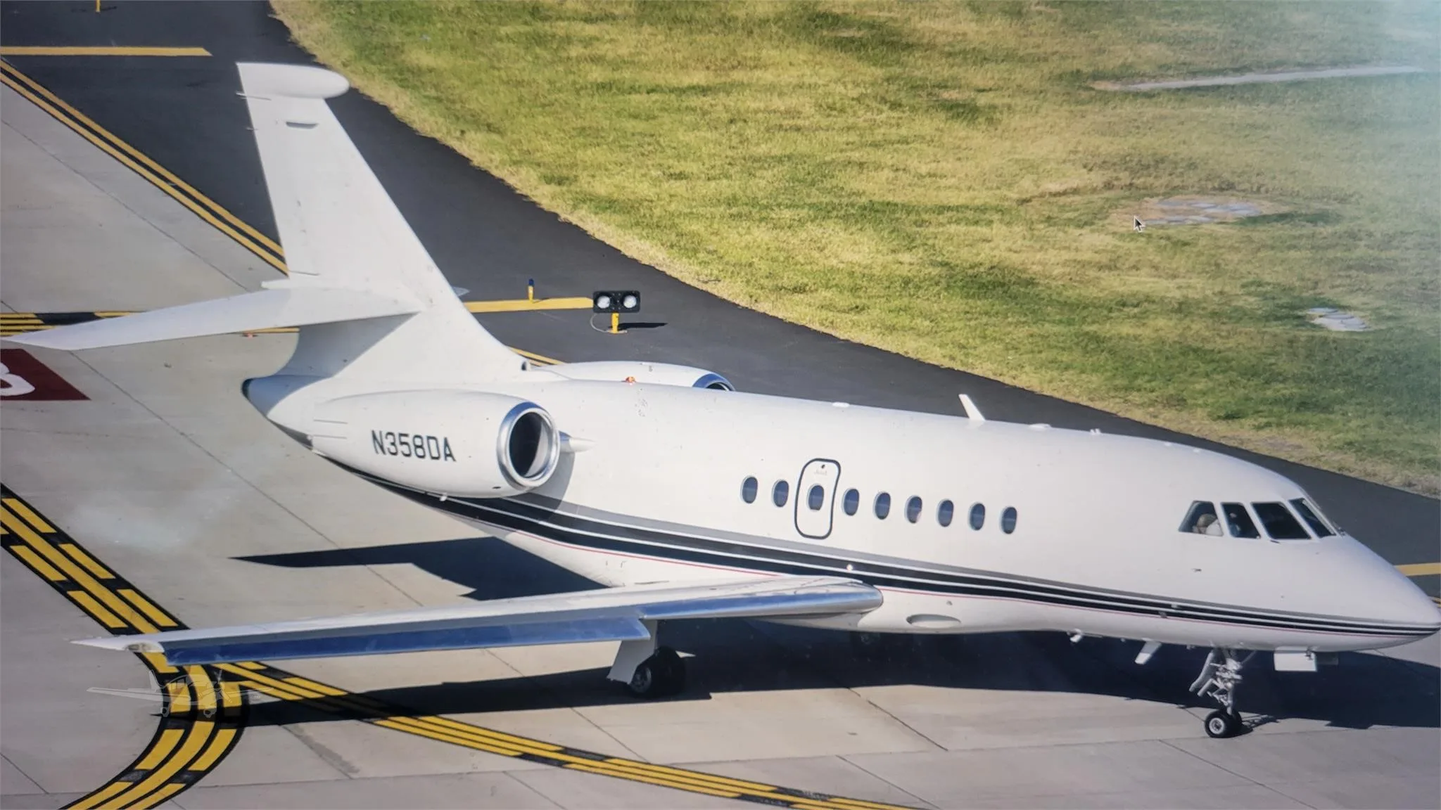 Exterior view of a 2003 DASSAULT FALCON 2000EX.