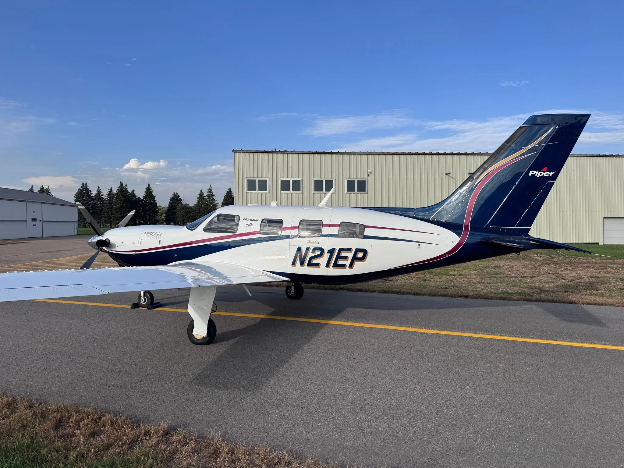 Exterior view of a 2013 PIPER MALIBU MERIDIAN, N21EP.