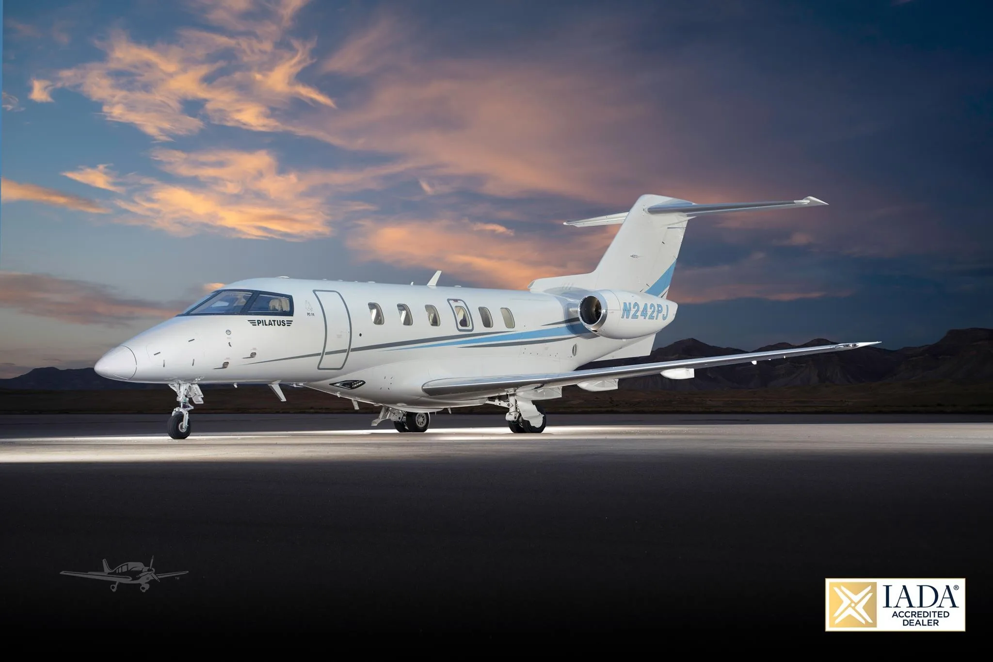 Exterior view of a 2021 PILATUS PC-24, N242PJ.