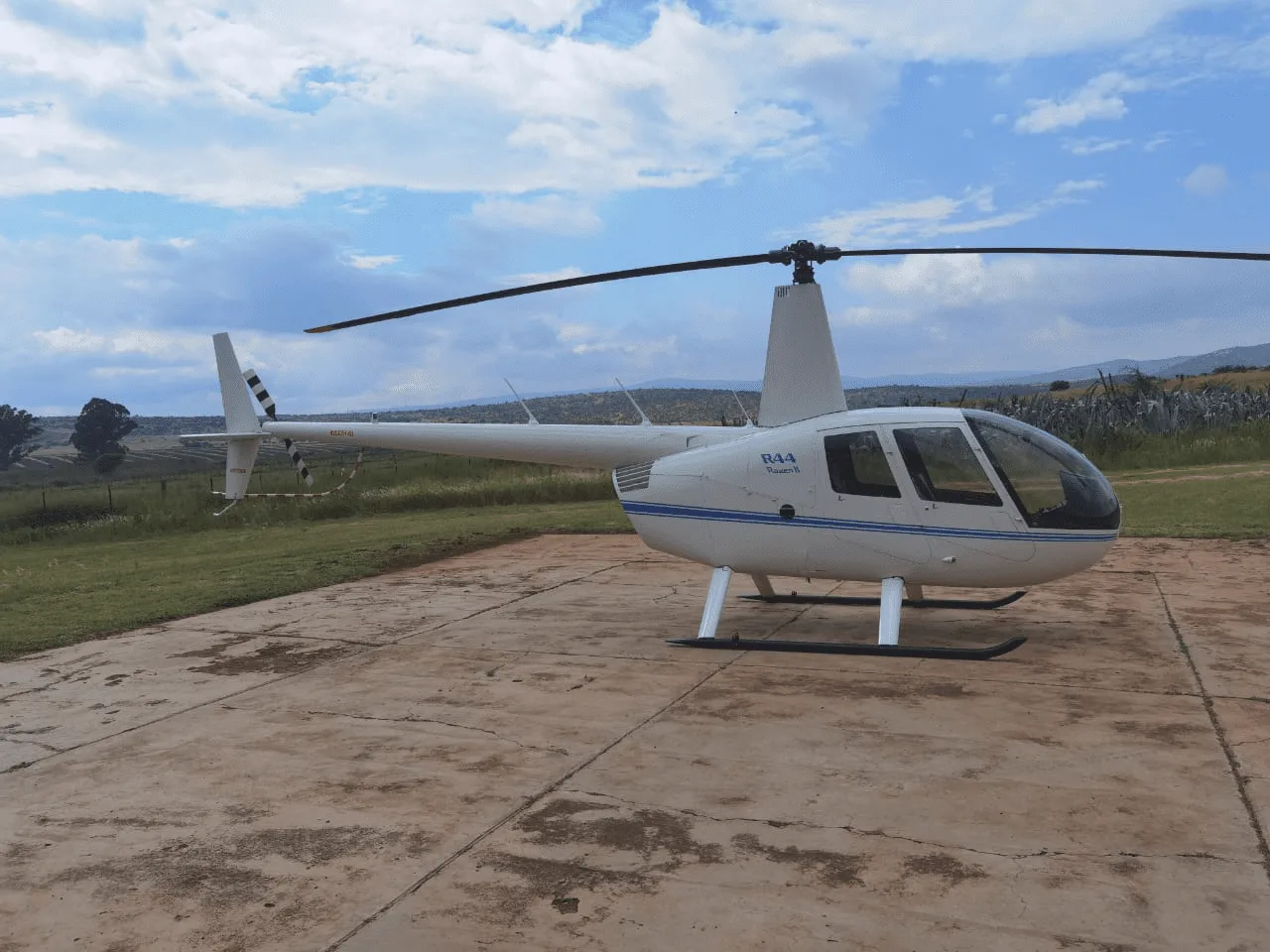 Marketing image of a 2013 Robinson R44 Raven II.