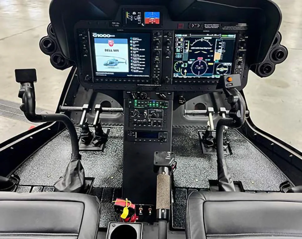 Cockpit and instrument panel of a 2026 Bell 505 Jet Ranger X.