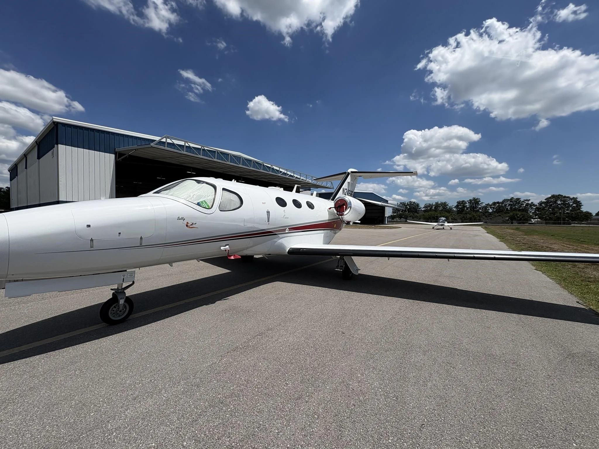 Exterior view of a 2010 CESSNA CITATION MUSTANG, N246RE.