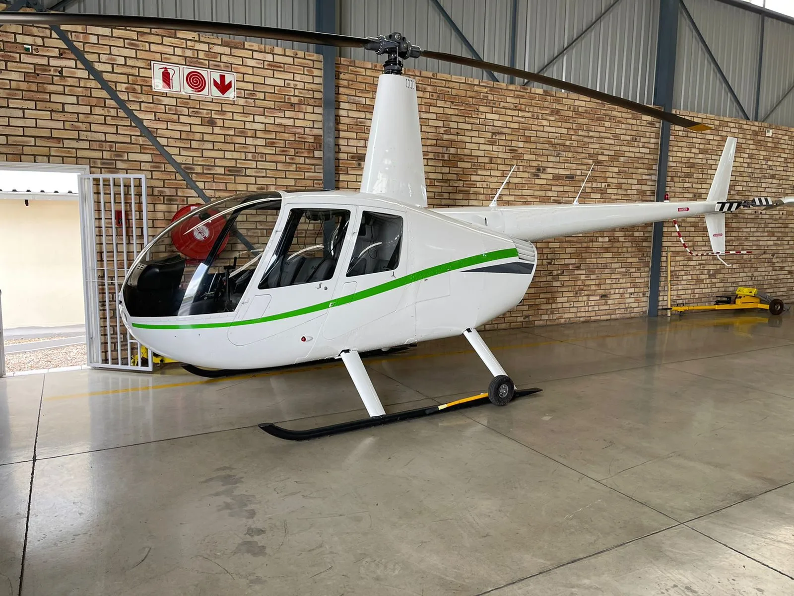 Exterior view of a 2008 Robinson R44 Raven II.