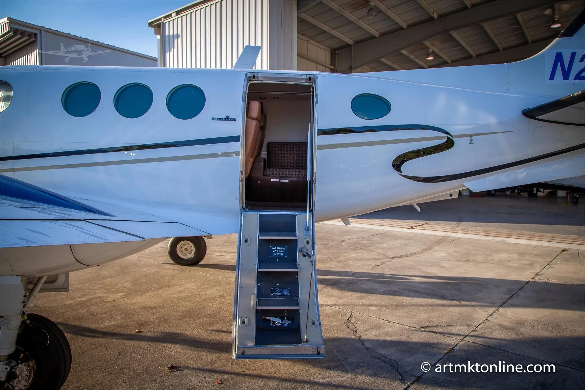 Exterior view of a 1979 BEECHCRAFT KING AIR C90, N2057C.