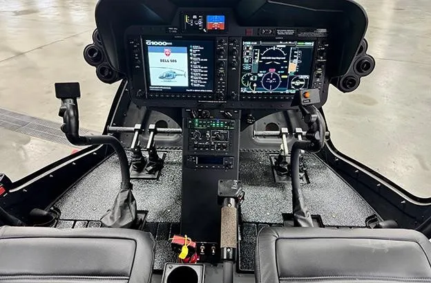 Cockpit and instrument panel of a 2026 BELL 505 JET RANGER X.