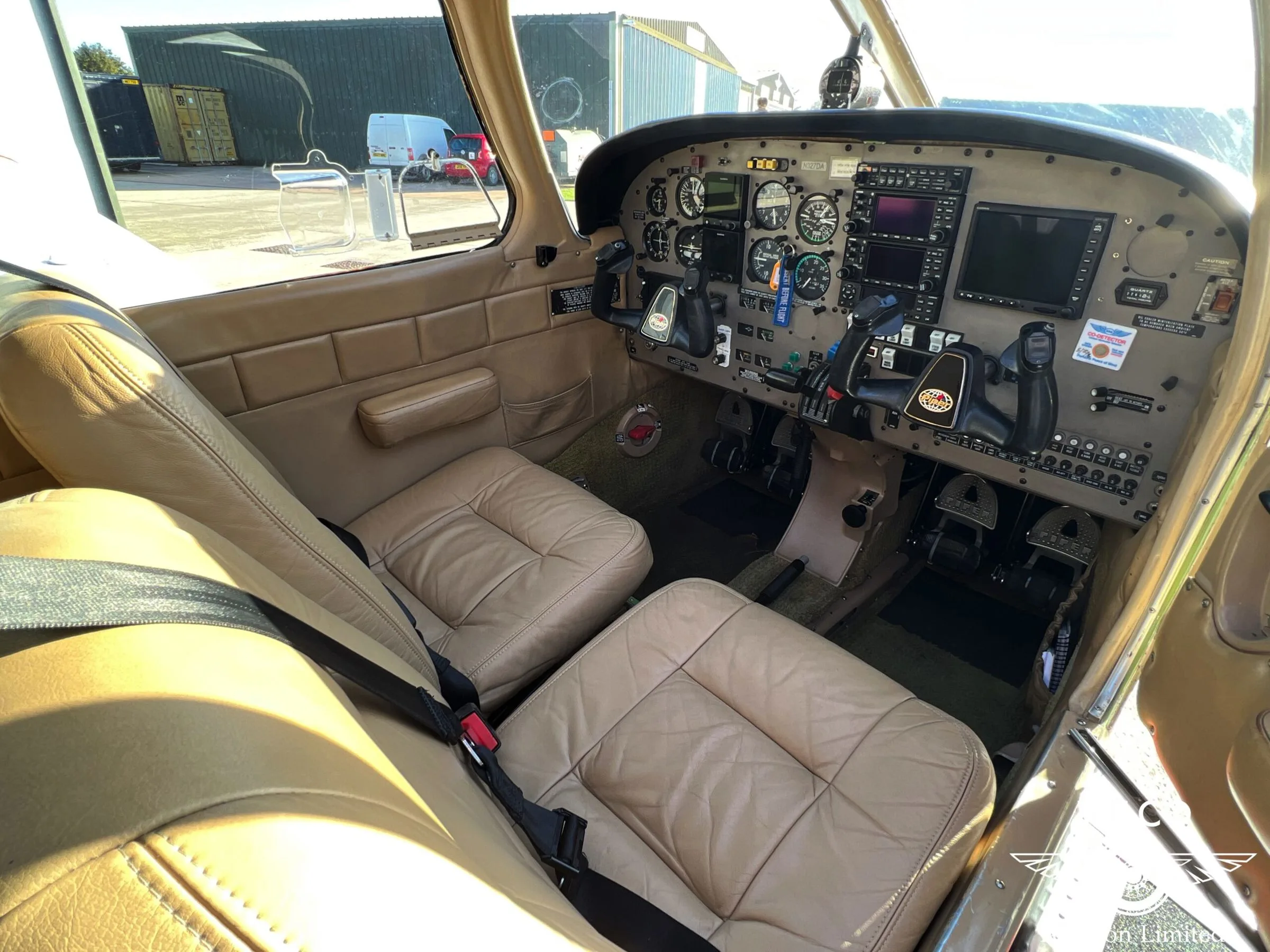 Cockpit and instrument panel of a 2002 Piper PA-28R-201 Arrow III.