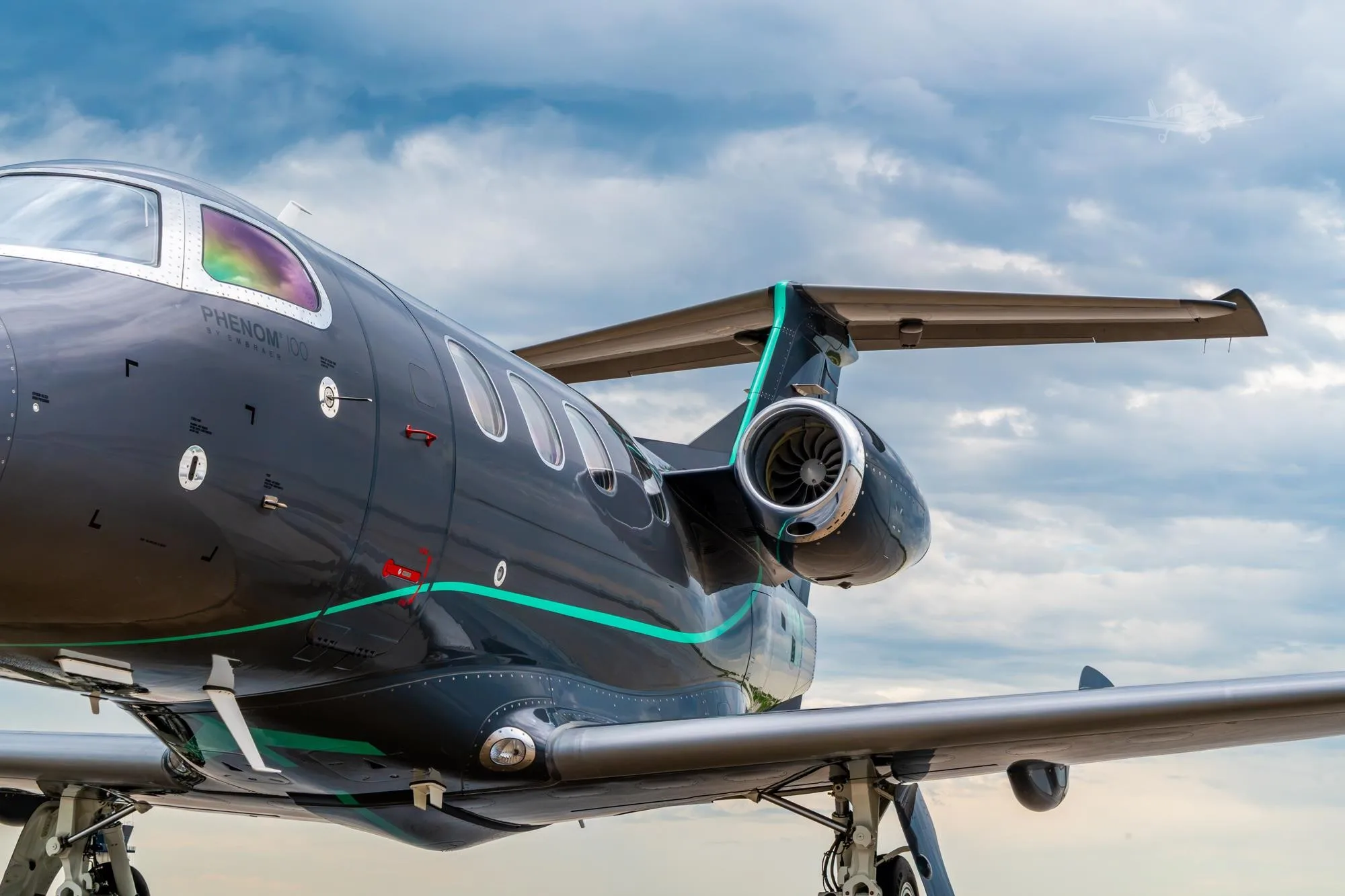 Exterior view of a 2010 EMBRAER PHENOM 100EV, N1WB.