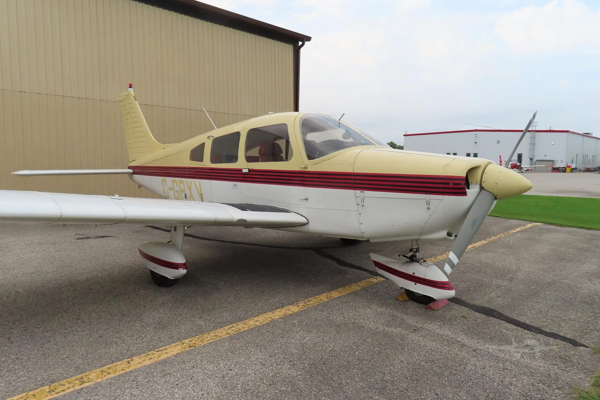 Exterior view of a 1976 PIPER WARRIOR, C-GPXV.