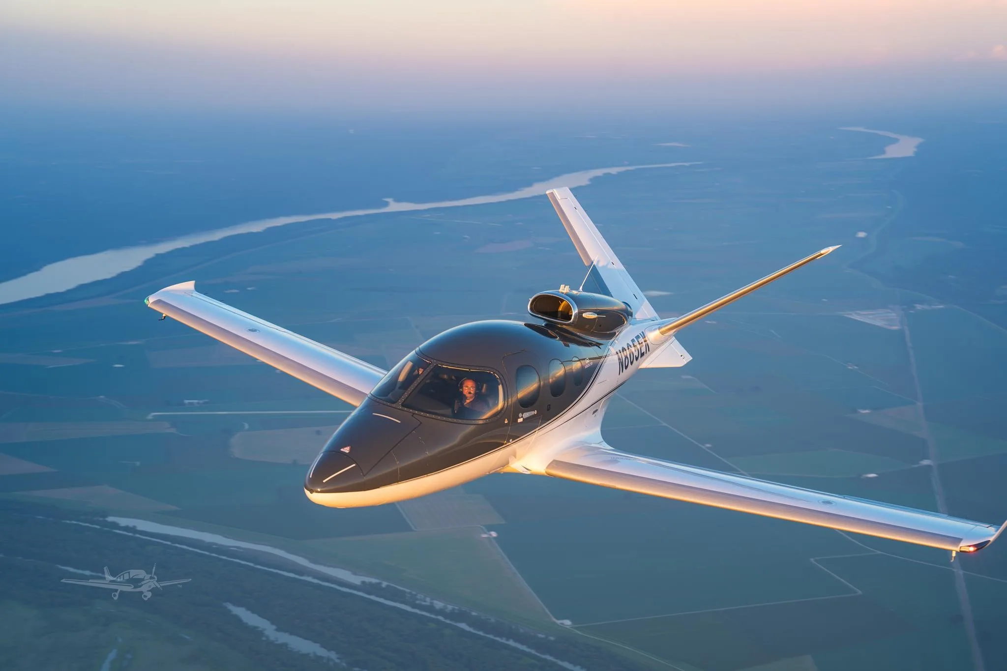 Exterior view of a 2019 CIRRUS VISION SF50, N865EK.