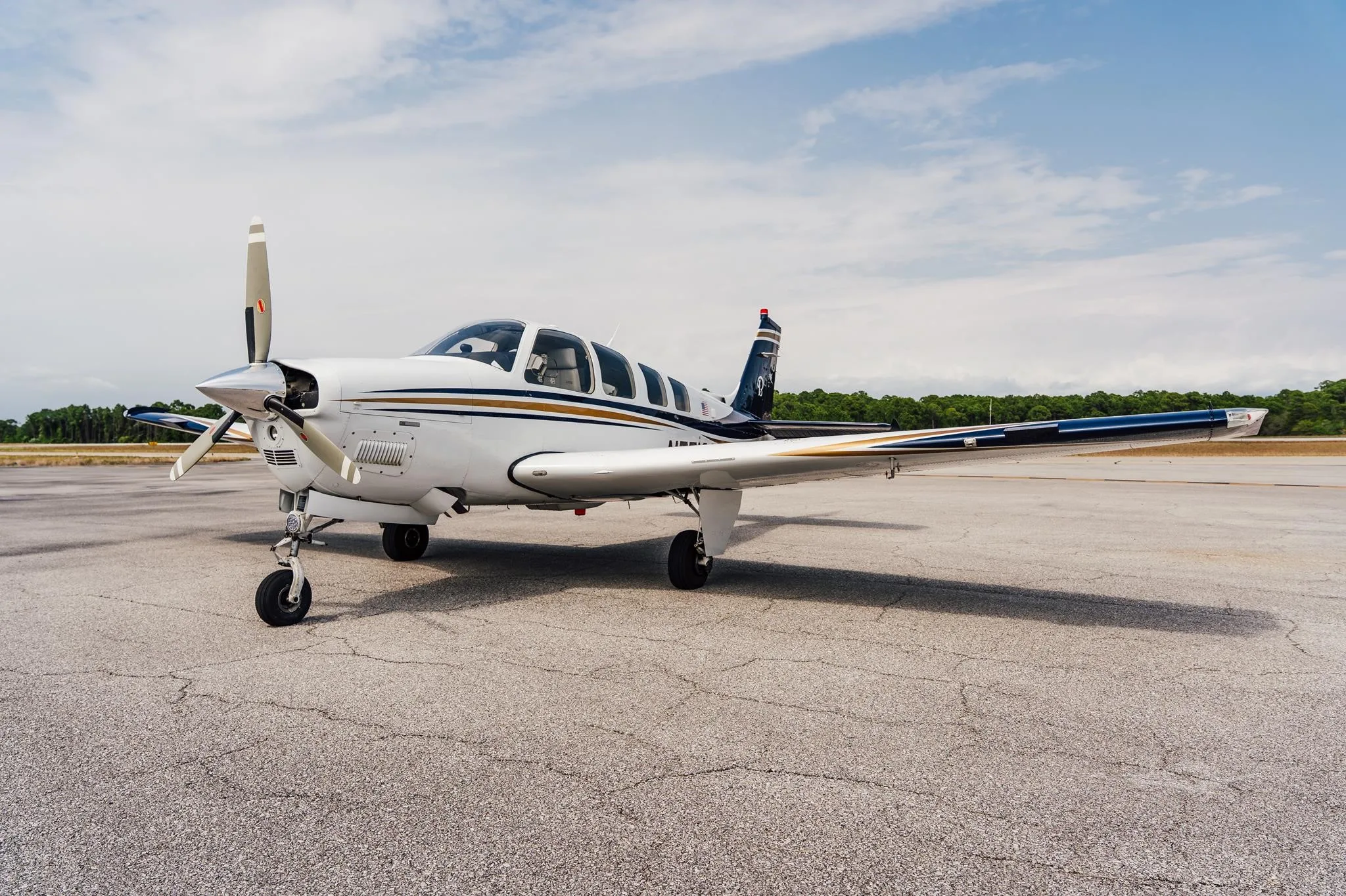 Exterior view of a 2006 BEECHCRAFT G36 BONANZA, N771CG.