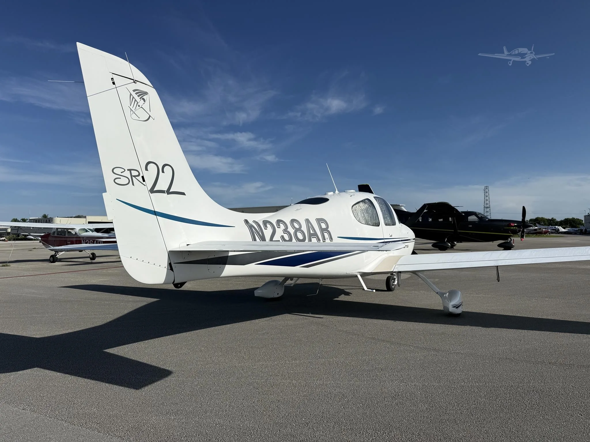 Exterior view of a 2002 CIRRUS SR22, N238AR.