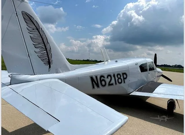 Exterior view of a 1959 PIPER COMANCHE 250, N6218P.