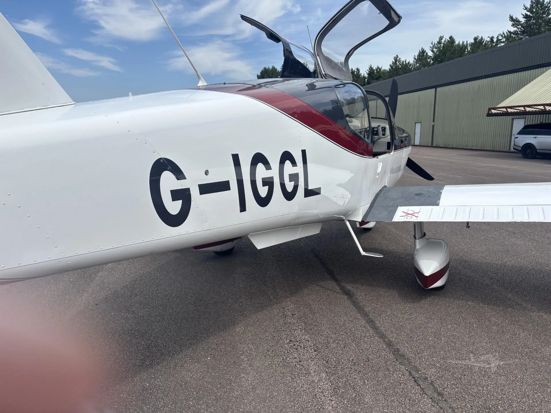 Exterior view of a 1980 SOCATA TB-10 TOBAGO, G-IGGL.