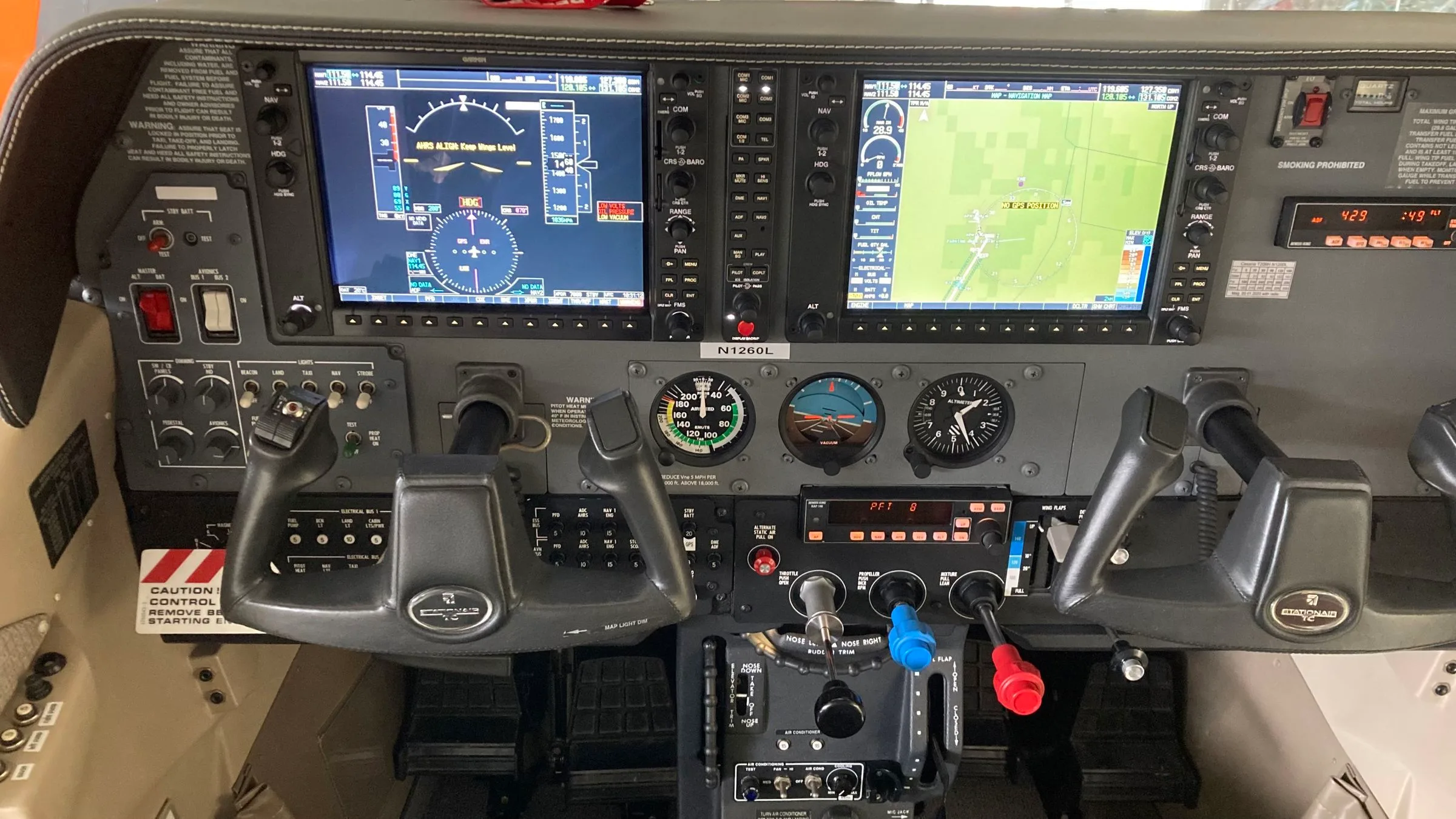 Cockpit and instrument panel of a 2006 Cessna T206H.