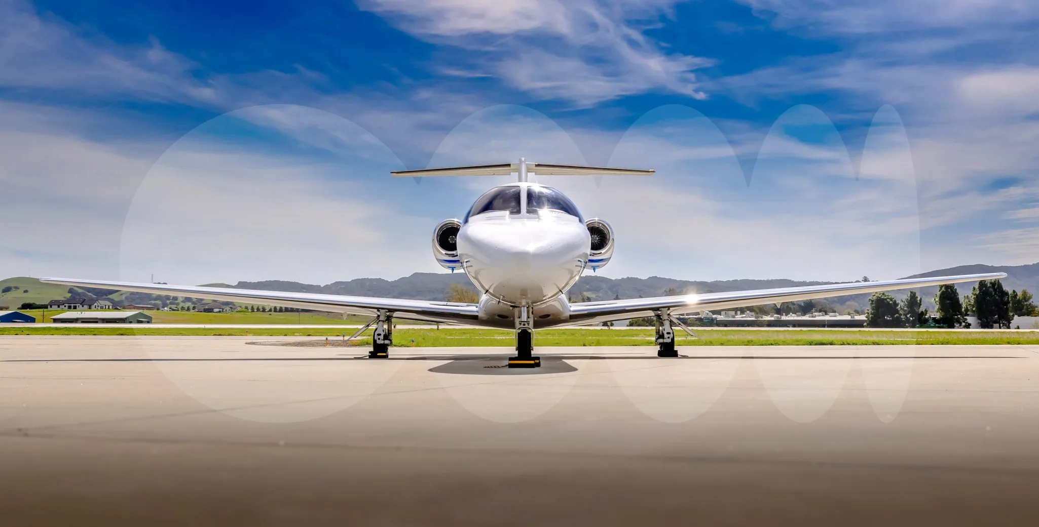 Exterior view of a 2009 Embraer Phenom 100.