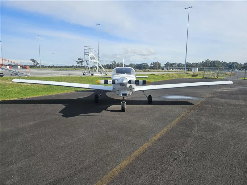 Exterior view of a 1995 Grob, VH-ZTA.