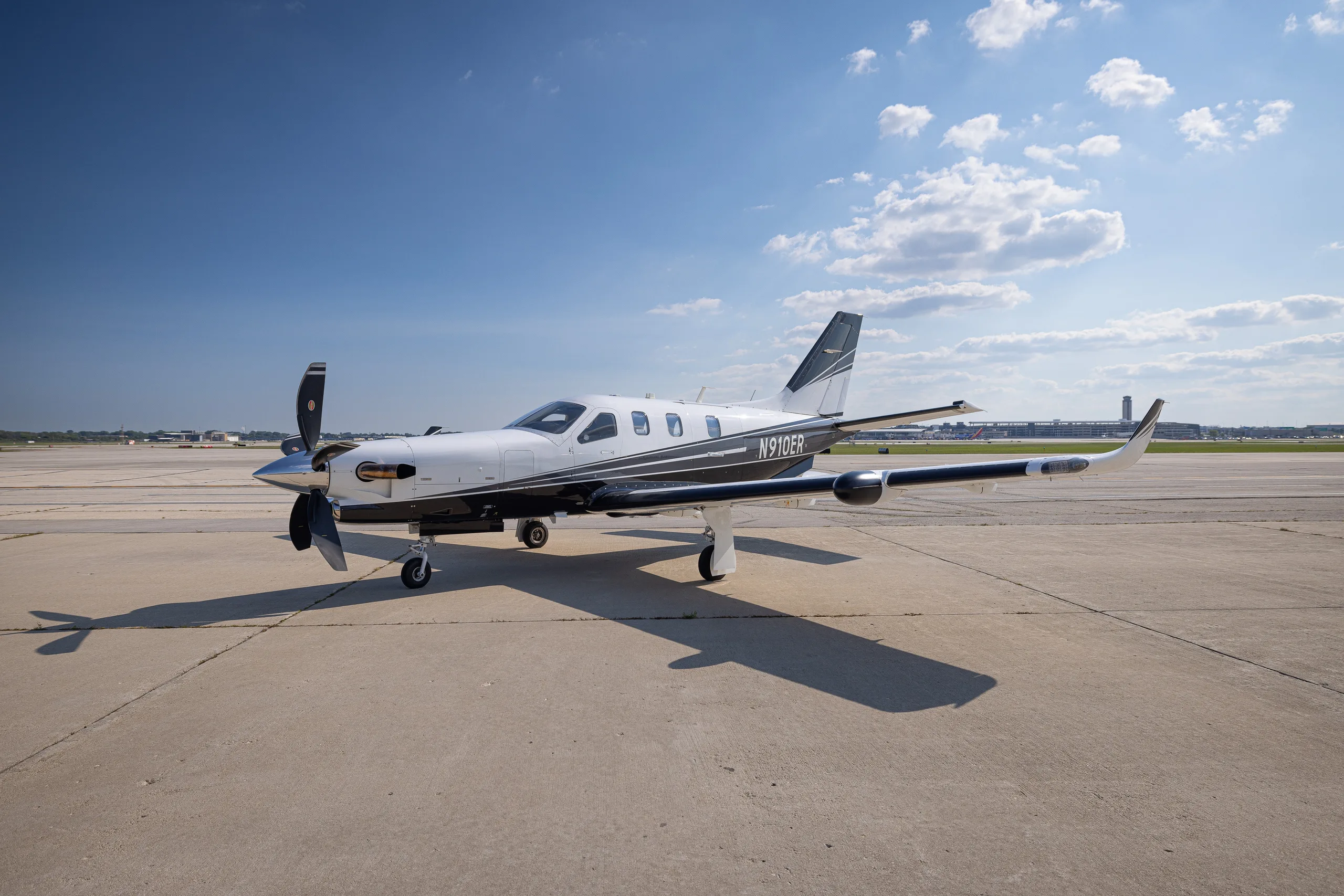 Exterior view of a 2019 Daher TBM 910, N910ER.