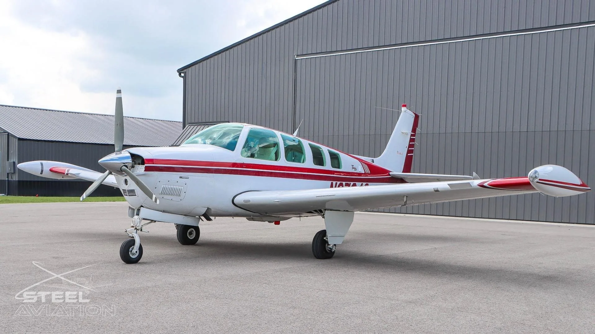 Exterior view of a 1997 BEECHCRAFT A36 BONANZA, N6784S.