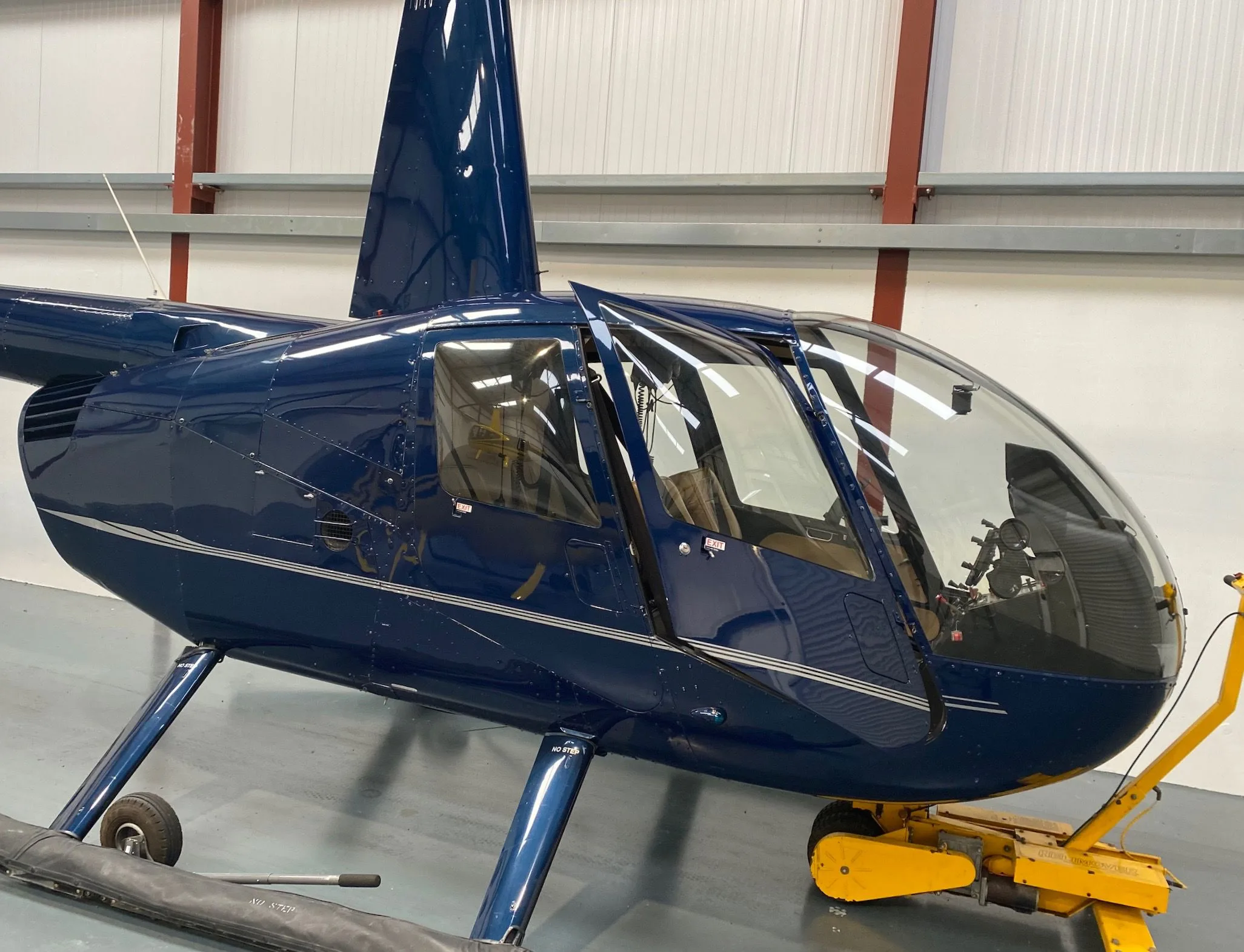 Exterior view of a 2005 Robinson R44 Clipper II.