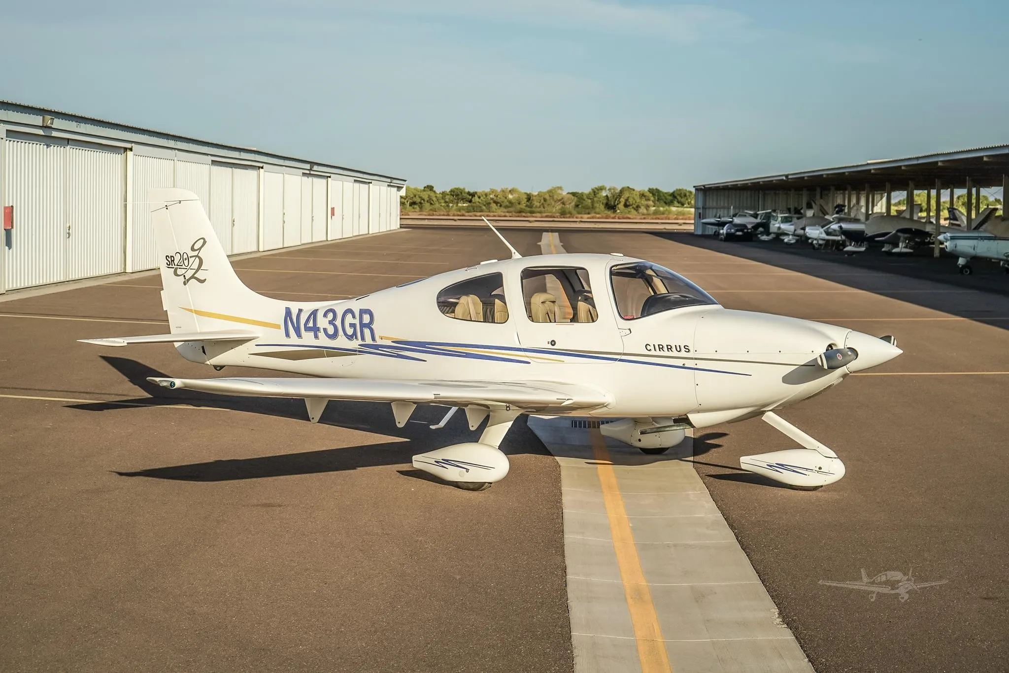 Exterior view of a 2005 CIRRUS SR20-G2, N43GR.