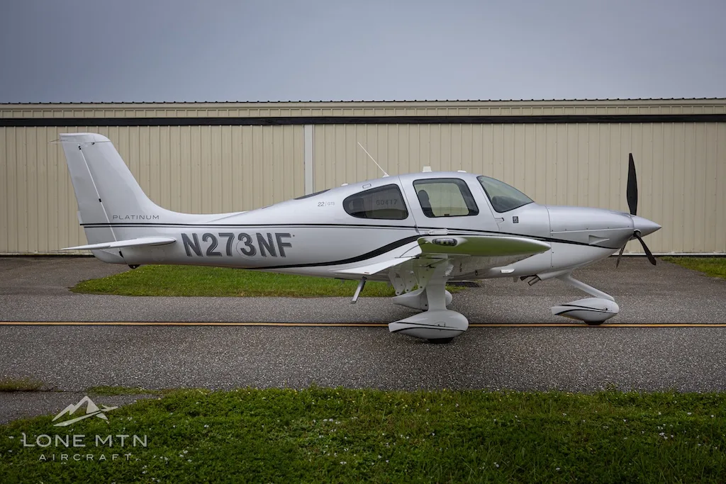 Exterior view of a 2016 Cirrus SR22 G5 GTS, N273NF.