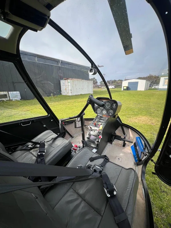 Cockpit and instrument panel of a 2007 Robinson R44 Raven II.