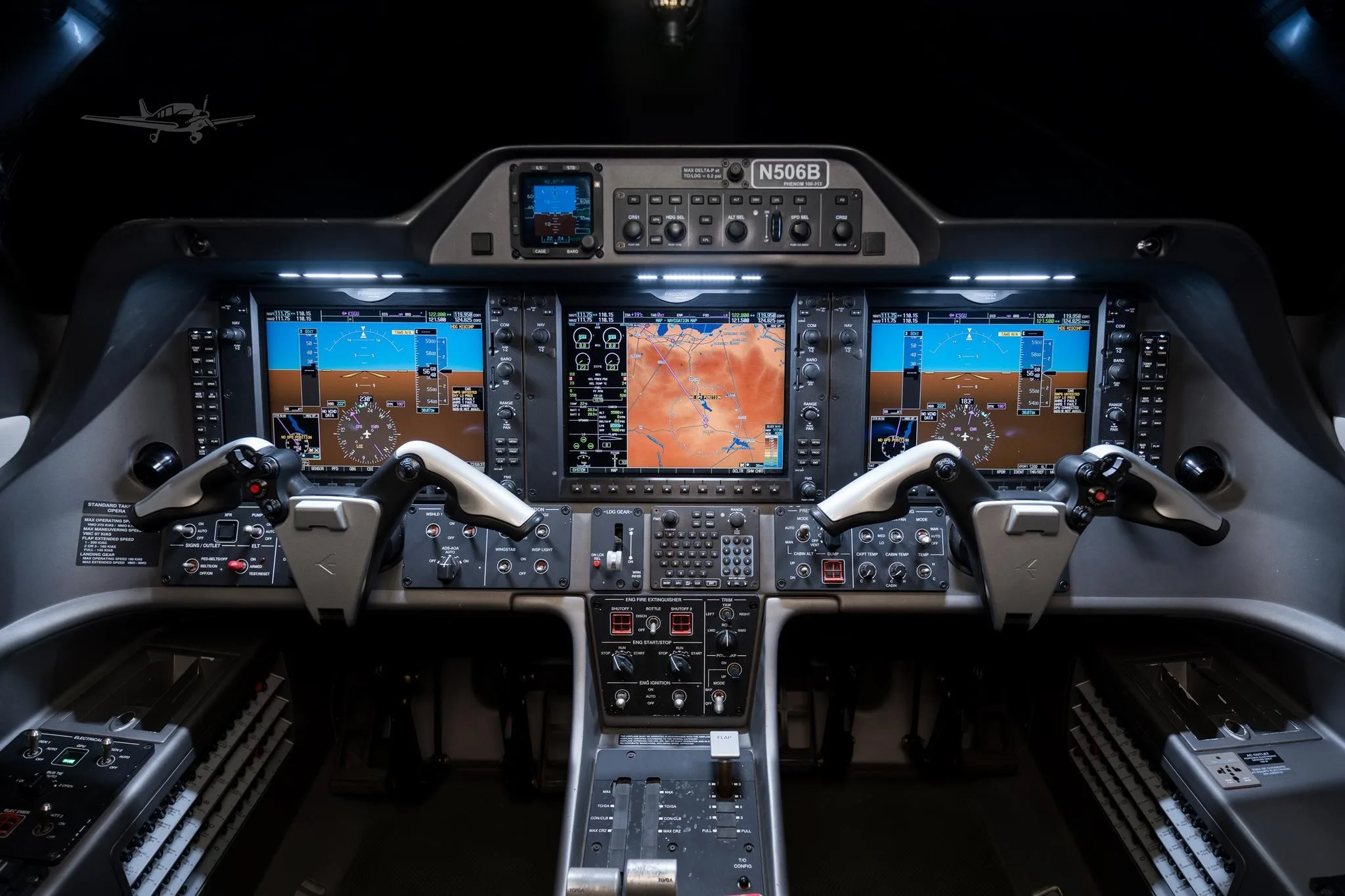 Cockpit and instrument panel of a 2013 EMBRAER PHENOM 100.