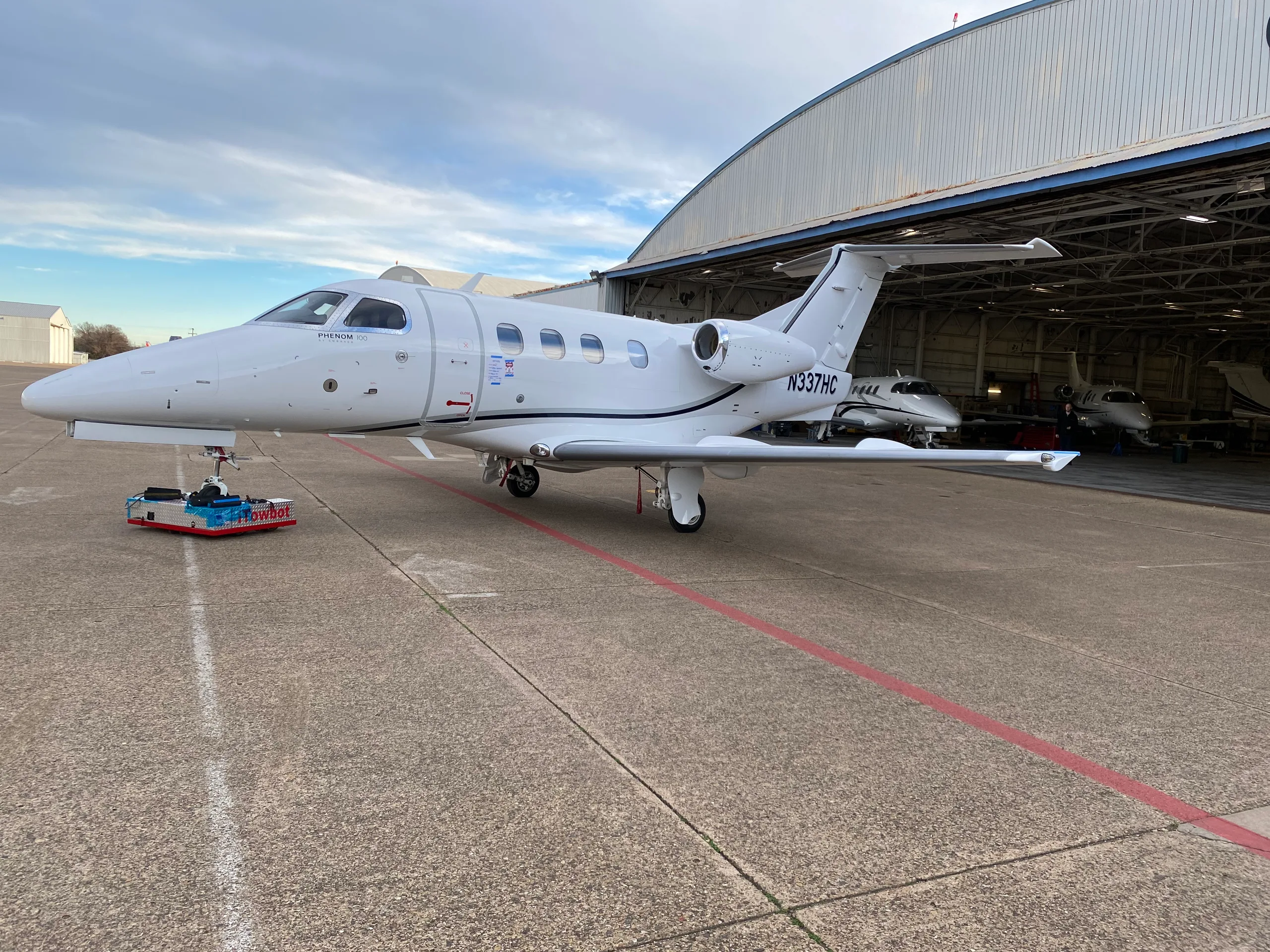 Exterior view of a 2010 Embraer Phenom 100 50000183, N337HC.