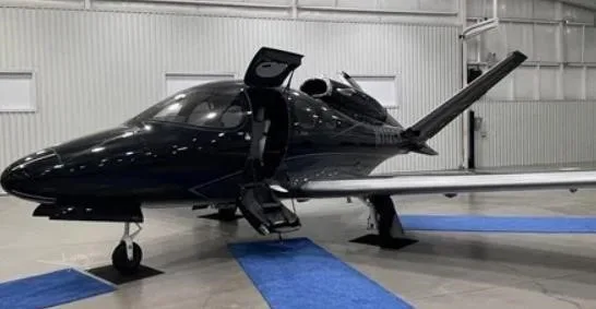 Exterior view of a 2023 CIRRUS VISION SF50-G2+, N112CK.