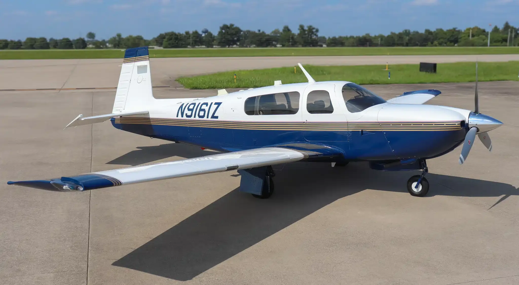 Exterior view of a 1996 Mooney M20J MSE, N2RH.