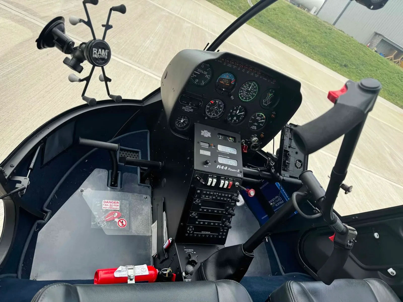 Cockpit and instrument panel of a 2017 Robinson R44 Raven II.