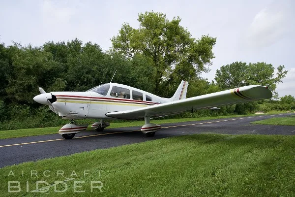 Marketing image of a 1974 Piper Cherokee Archer.