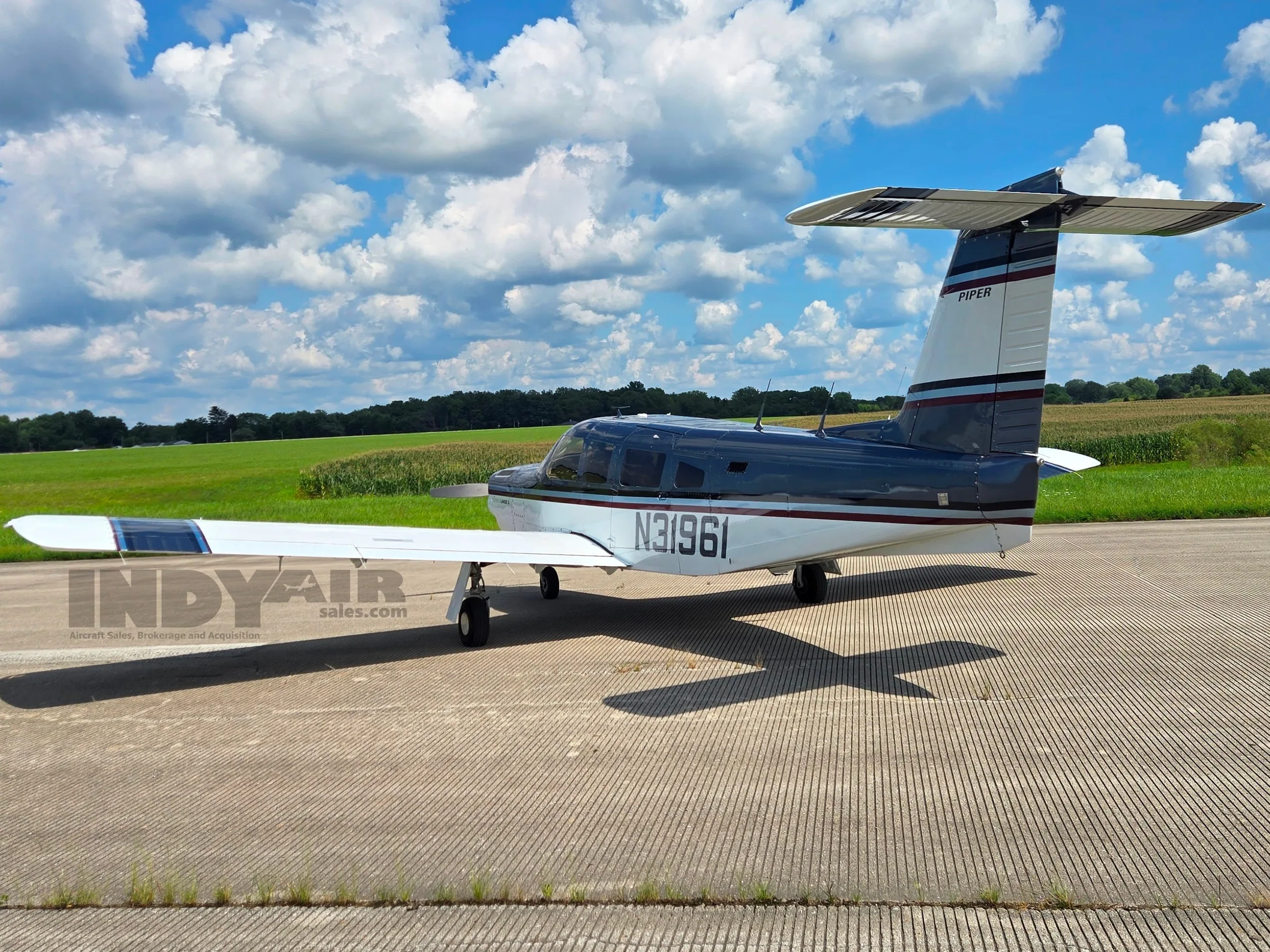 Exterior view of a 1978 Piper 32RT-300T, N31961.