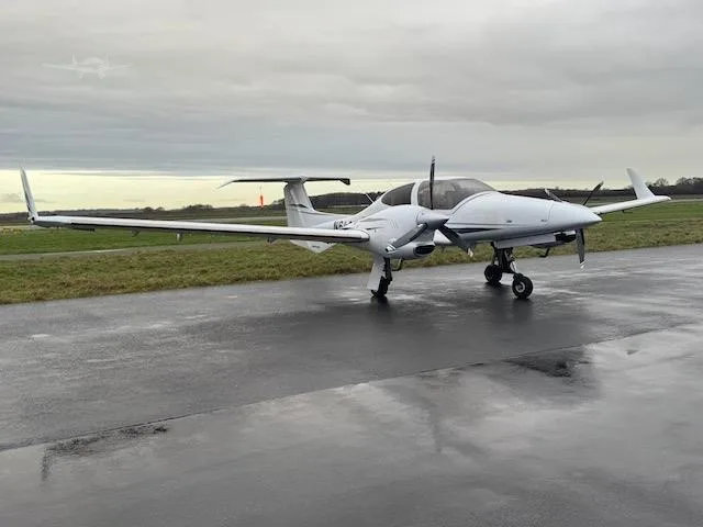 Exterior view of a 2008 DIAMOND DA42 TDI, N618KM.