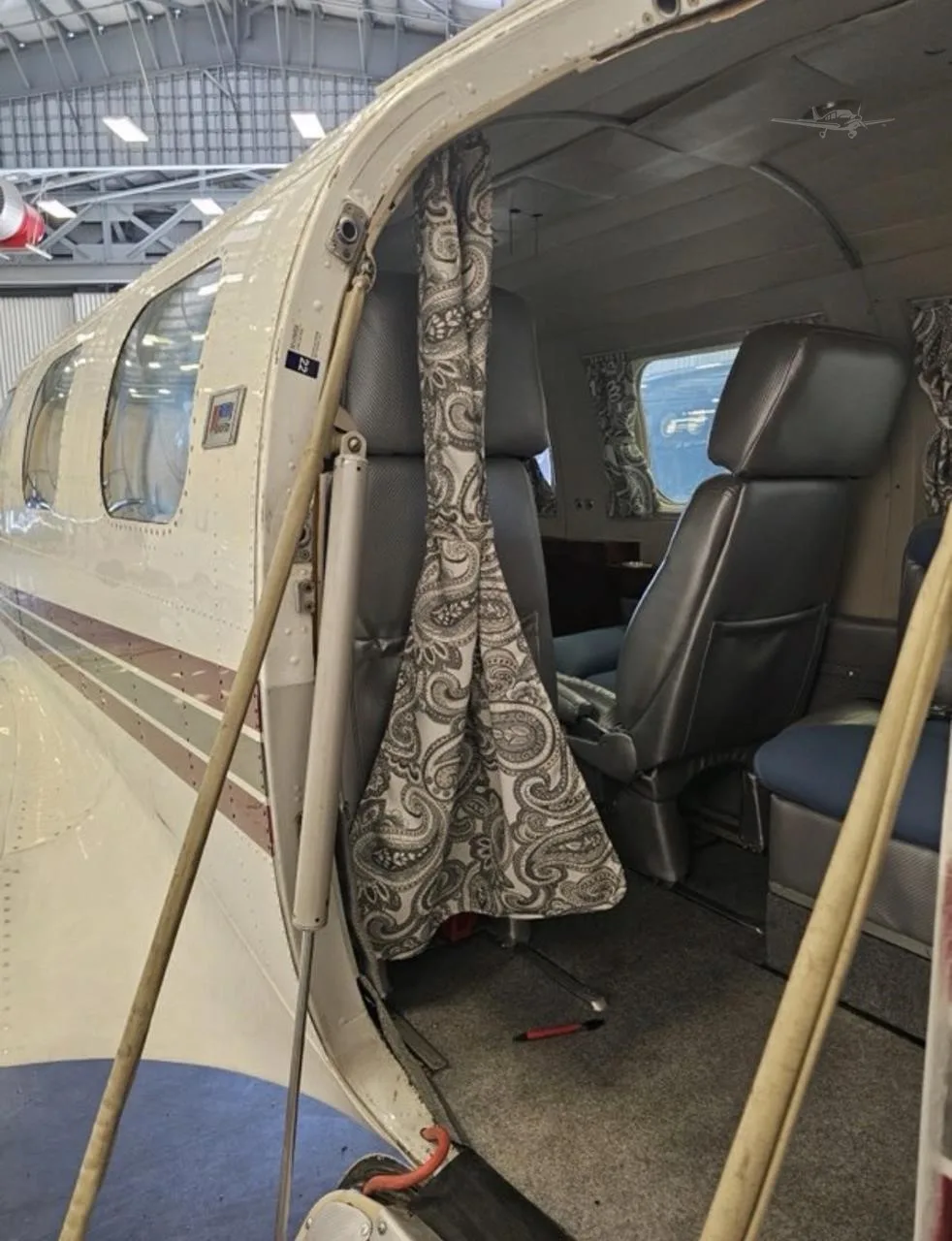 Exterior view of a 1976 PIPER CHEYENNE II, N55R.