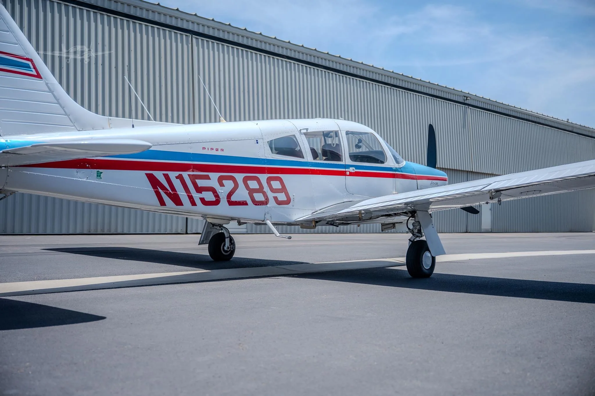 Exterior view of a 1972 PIPER ARROW II, N15289.