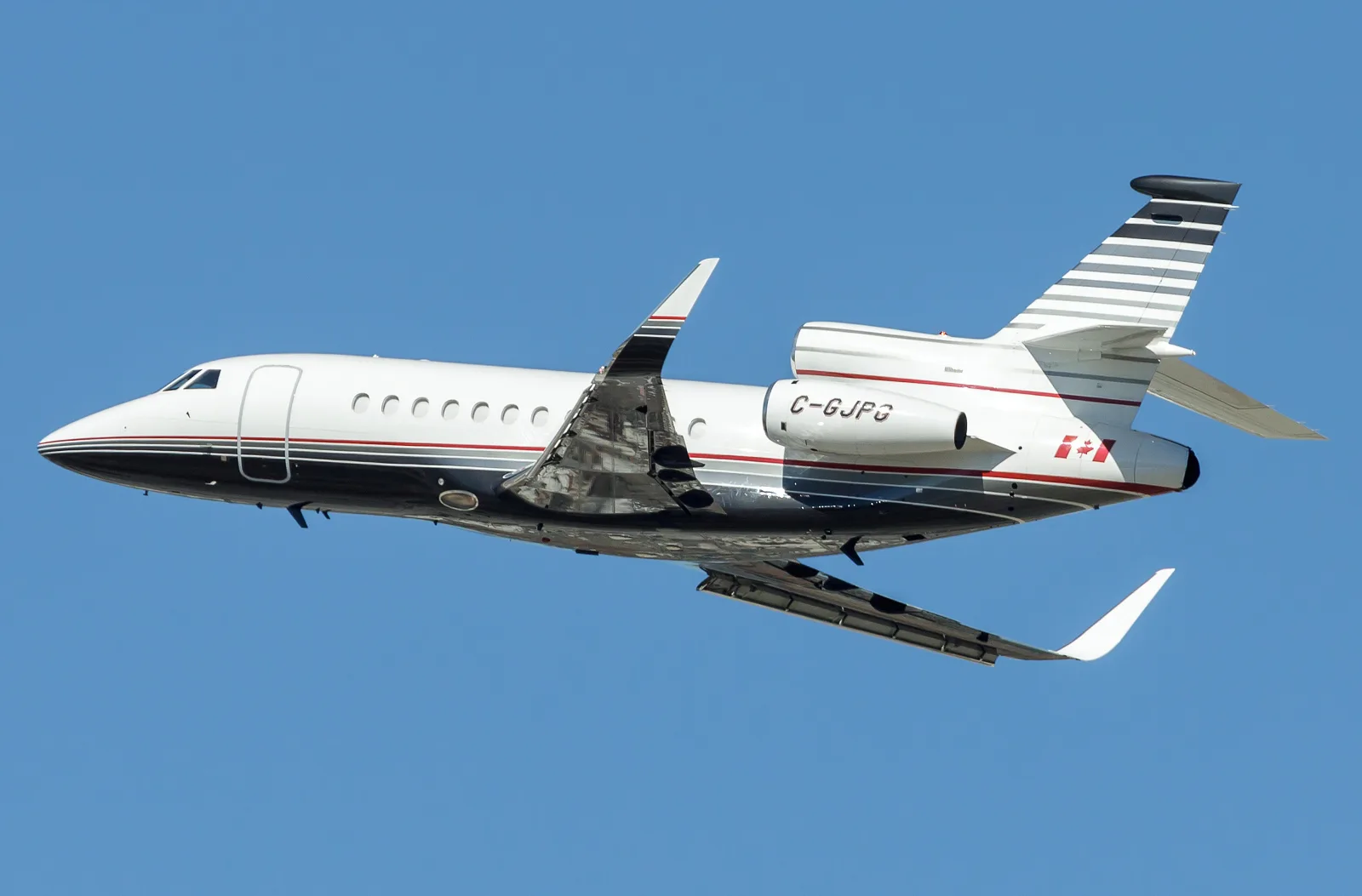 Marketing image of a 2003 Dassault Falcon 900EXy SN129.