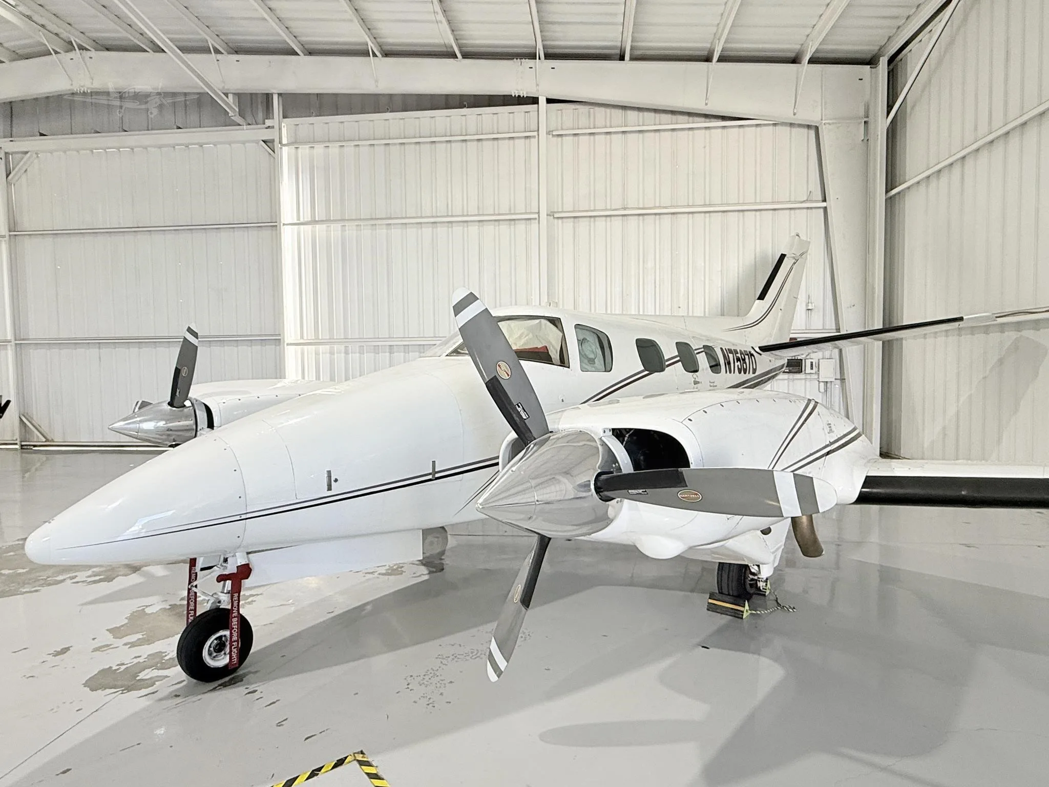 Exterior view of a 1971 BEECHCRAFT A60 DUKE, N7587D.