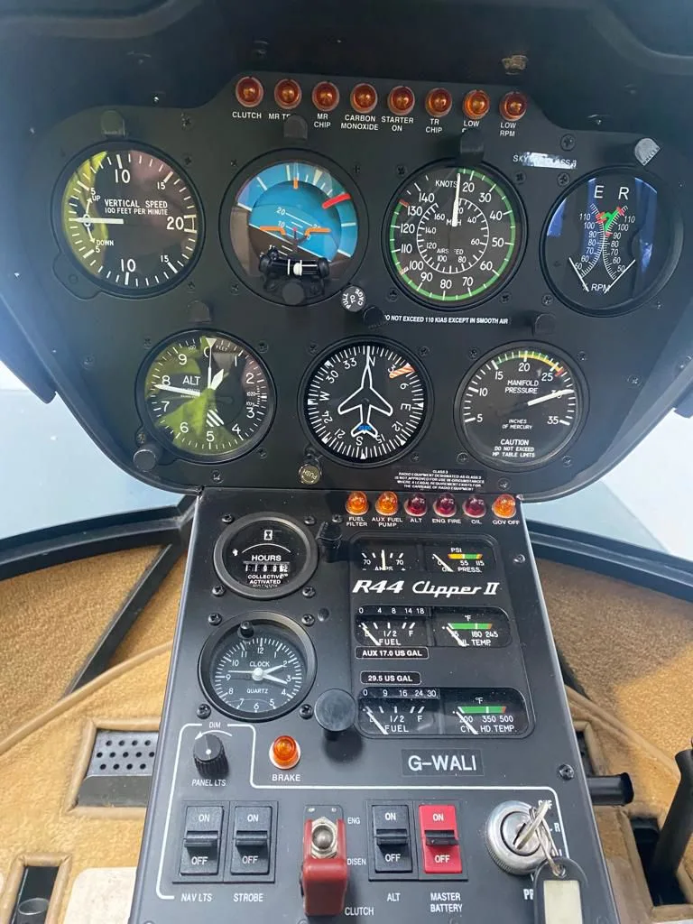 Cockpit and instrument panel of a 2005 Robinson R44 Clipper II.