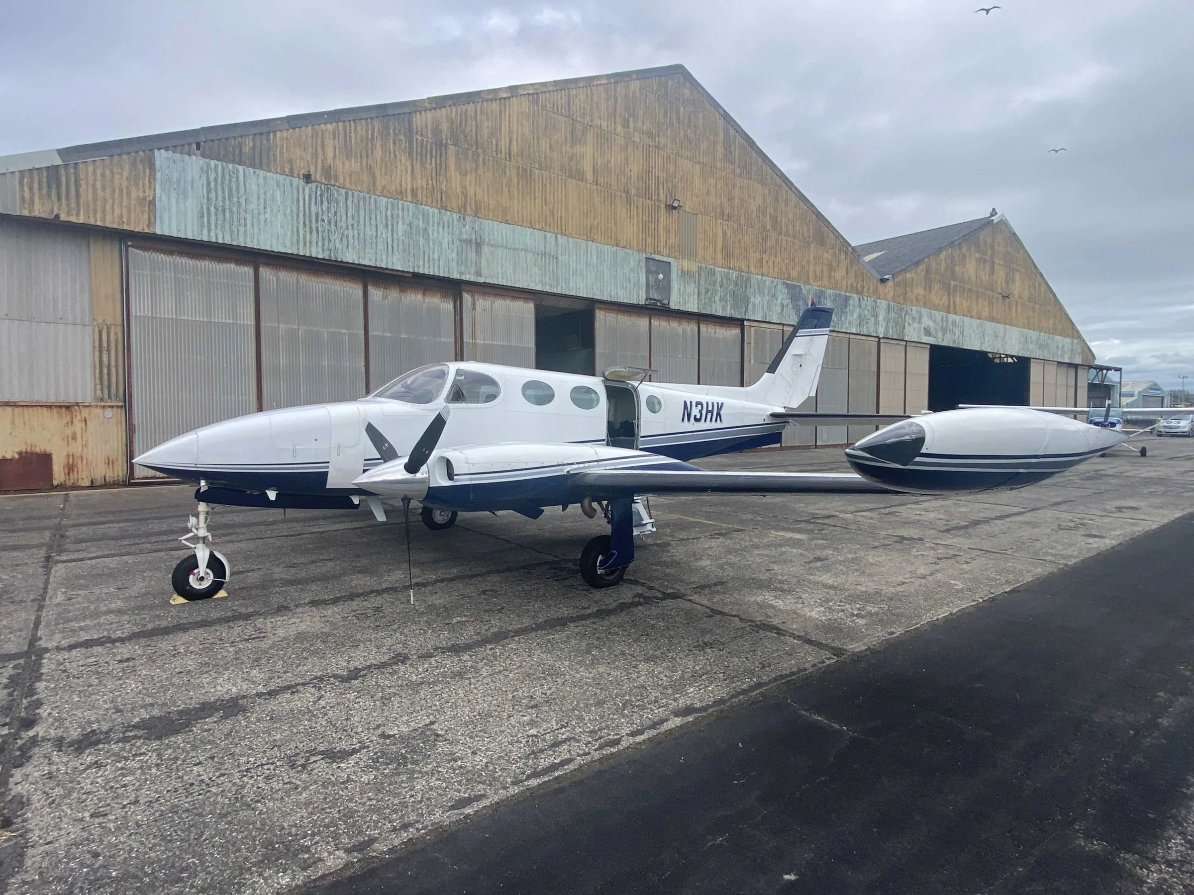 Exterior view of a 1975 Cessna 340, N3HK.